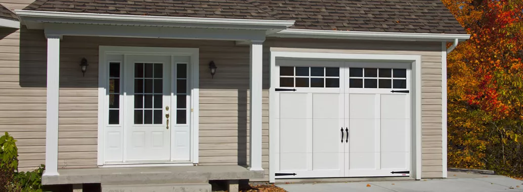 Eastman E-12, 9' x 7', Ice White door and overlays, 8 lite Panoramic windows